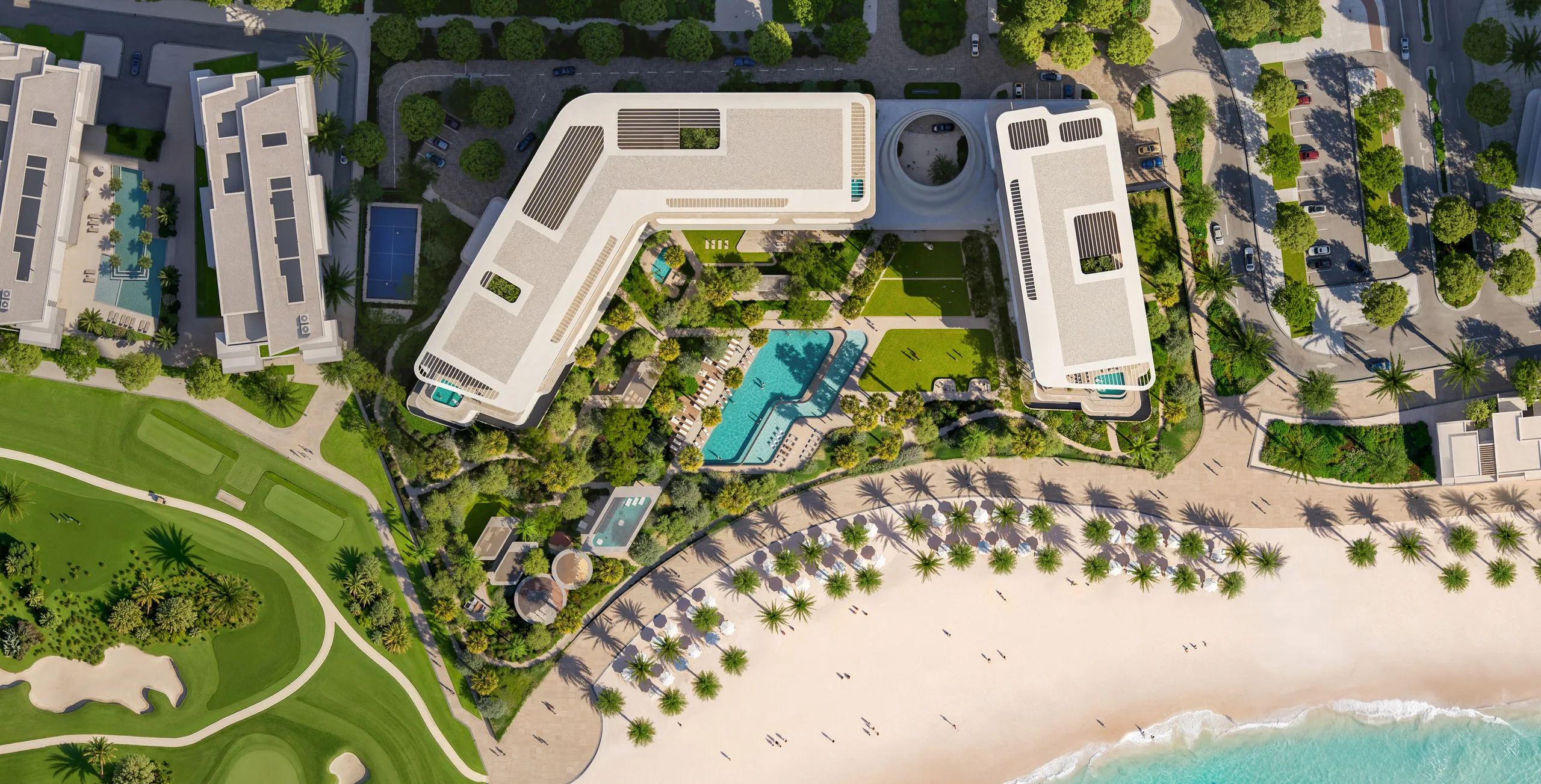 The gardens, pools and beach seen from directly above